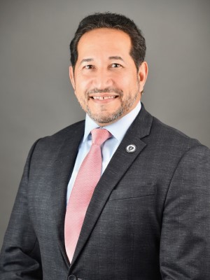 Representative Carlos González
